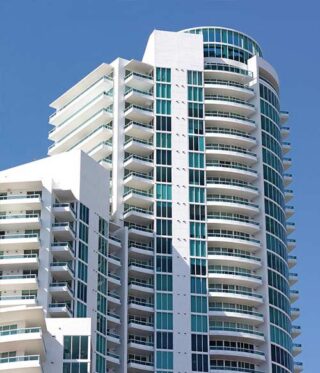 Hospitality industry hotel building against blue sky