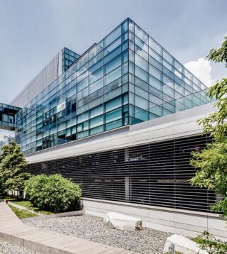 Commercial property office building covered in blue windows